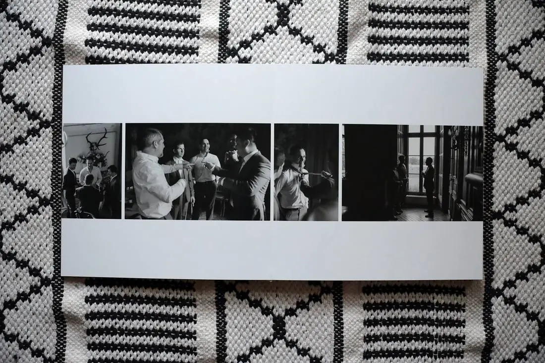 Black-and-white getting ready on a white spread
